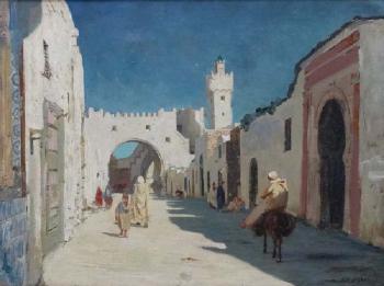 An Arab street scene with figures entering the Casbah (Citadel) by 
																			Auguste J F Legras
