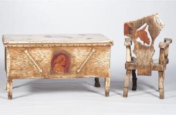 Western motif carved desk and chair by 
																			Harley Niblack