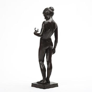 Standing girl with oil lamp by 
																			Hugo Elmqvist