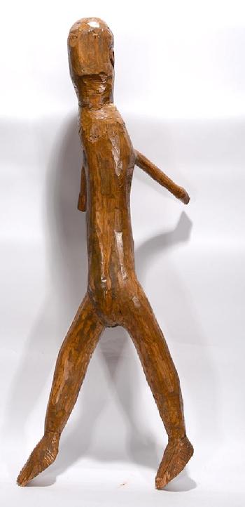 Large wooden figure by 
																			Raymond Coins