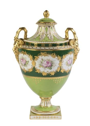 Floral porcelain lidded urn by 
																	 Royal Crown Derby Porcelain