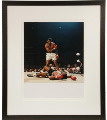 Muhammed Ali KO's Sonny Liston for the World Heavyweight Title, at St Dominic's Arena in Lewiston, Maine on May 25, 1965 by 
																			Neil Leifer