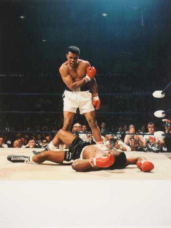 Muhammed Ali KO's Sonny Liston for the World Heavyweight Title, at St Dominic's Arena in Lewiston, Maine on May 25, 1965 by 
																			Neil Leifer