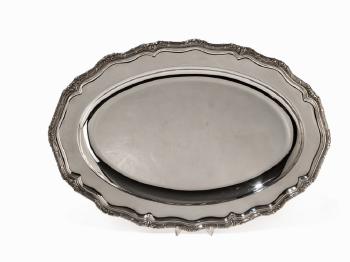An oval serving tray by 
																			 H Meyen & Co