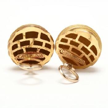 Gold ridged dome earrings by 
																			Christopher Walling