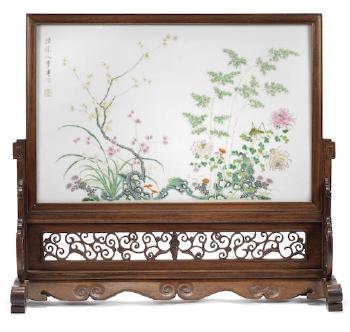 A famille rose rectangular plaque by 
																	 Pu Jian