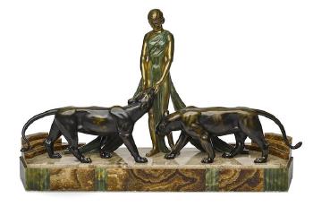 An Art Deco group of a maiden and two panthers by 
																	Alexandre Ouline