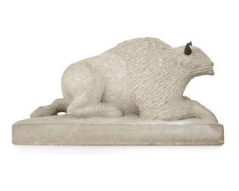 A carved Indiana limestone sculpture by 
																			Bob Haozous