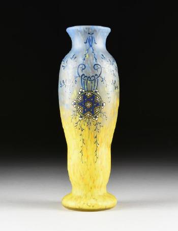 An enameled art glass vase by 
																			Auguste J F Legras