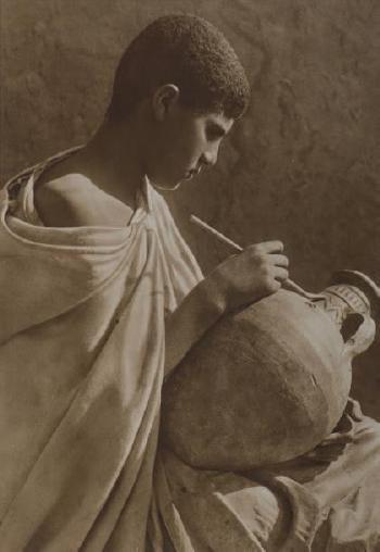 Tunisie, Jeune homme peignant une jarre by 
																	Ernst Heinrich Landrock
