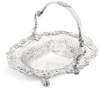 A George II silver swing-handle bread basket
 by 
																	 Samuel Herbert & Co.