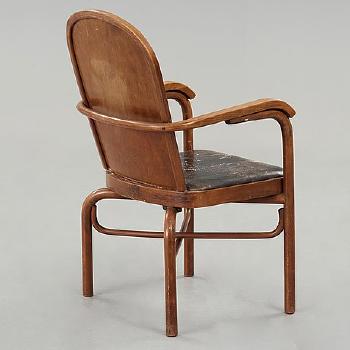 A Stained Beech And Black Leather Armchair, Gemla, Sweden Circa 1932 by 
																			Sigurd Lewerentz