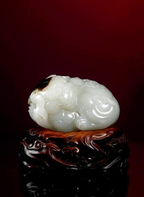 A white jade beast by 
																	 Qu Lijun