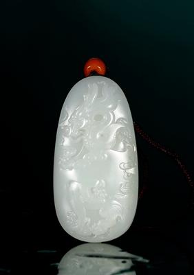 A white jade plaque with dragon pattern by 
																	 Guo Wanlong