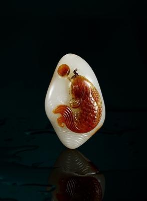 A white jade fish pendant by 
																	 Xu Zhihao
