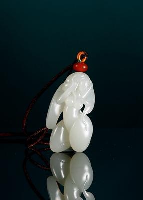 A white jade pendant with beauty pendant by 
																	 Wang Jinzhong