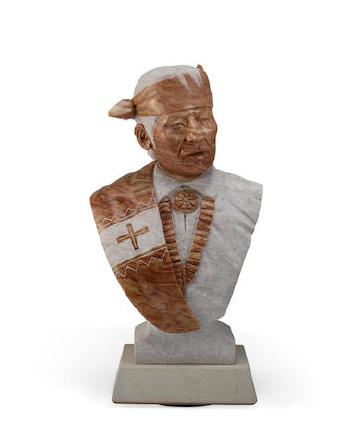 The bust of a Navajo man by 
																	Oreland C Joe