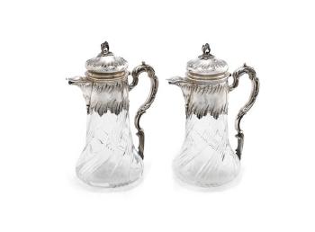 A pair of French claret jugs by 
																	Elie Vabre