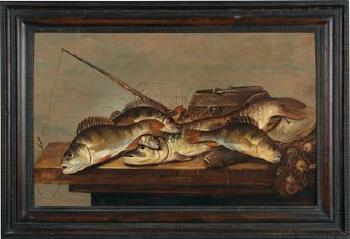 A still life with fish and fishing utensils on a table by 
																			Pieter de Putter