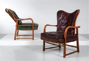 Two armchairs by 
																	Oswald Haerdtl