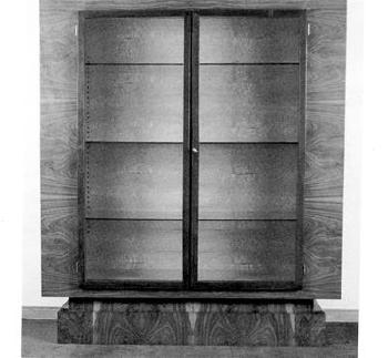 A large display cabinet by 
																			Michael Rachlis