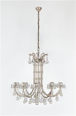 A chandelier by 
																			Oswald Haerdtl