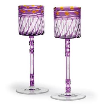 A pair of wine glasses by 
																	 Meyrs Neffe