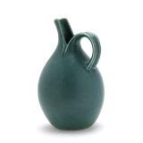 A large pitcher decorated with turquoise green glaze by 
																			Eva Staehr-Nielsen