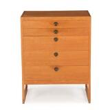 An chest of drawers by 
																			 P Lauritsen & Sons
