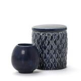 Stoneware lid jar and small vase decorated with dark blue glaze by 
																			Eva Staer-Nielsen