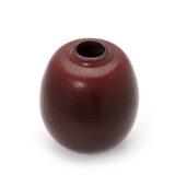 Stoneware vase decorated with oxblood glaze by 
																			Kresten Bloch