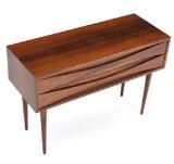 A rosewood chest with two drawers and a rectangular rosewood mirror. Model 165 by 
																			 N C Mobler