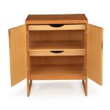 Oak cabinet with runner legs by 
																			 P Lauritsen & Sons
