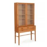 Console table of oak with five drawers and display cabinet top with adjustable shelves by 
																			Kaj Winding