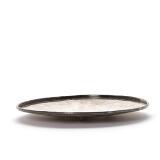 Circular sterling silver dish with hammered surface, Profiled rim and three small feet by 
																			 Hans Hansen Silver