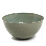 A stonware bowl decorated with green glaze by 
																			Per Rehfeldt