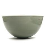 A stonware bowl decorated with green glaze by 
																			Per Rehfeldt