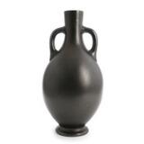 A black glazed ceramic vase with double handle by 
																			Giovanni Gariboldi