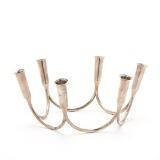 A six-branch sterling silver candelabrum with curved base Oblique candle holders by 
																			 A Michelsen Co