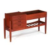 Teak hall furniture with underlying shelf and flower box, front with three drawers by 
																			 Vinde Møbelfabrik