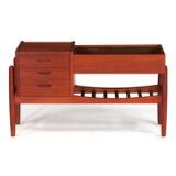 Teak hall furniture with underlying shelf and flower box, front with three drawers by 
																			 Vinde Møbelfabrik