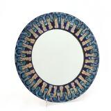 A Circular Wall Mirror, Frame Of Copper Plates Decorated With Polychrome Enamel by 
																			Bodil Eje