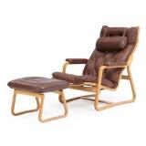 Easy chair with adjustable back and matching stool by 
																			Adrian Heath