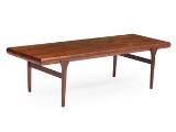 A rosewood coffee table with extension in both ends, one extension with drawer by 
																			C F Christensen