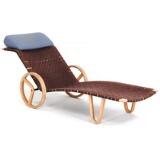 Daybed of with frame and wheels of beech by 
																			 Magnus Olsen
