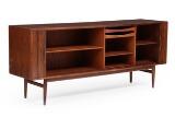 A freestanding rosewood sideboard, front with two sliding doors, mahogany interior with shelves and trays by 
																			 Faarup Mobelfabrik