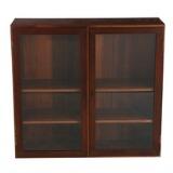 Upper display cabinet of rosewood Front with two glass doors. by 
																			Kaj Winding