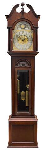 A George III style mahogany quarter chiming tallcase clock by 
																	 J C Jennens and Son