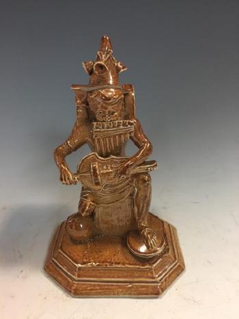  A Rare Stoneware One Man Band Figure
 by 
																			George Tinworth