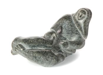 Inuit Carving of Hunter by 
																			Alasie Naulayik